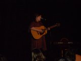 Adele playing the guitar